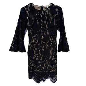 Francesca’s black lace dress with beautiful details on bottom of dress. Size XS